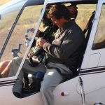 Pilot And Netgunner in Helicopter.